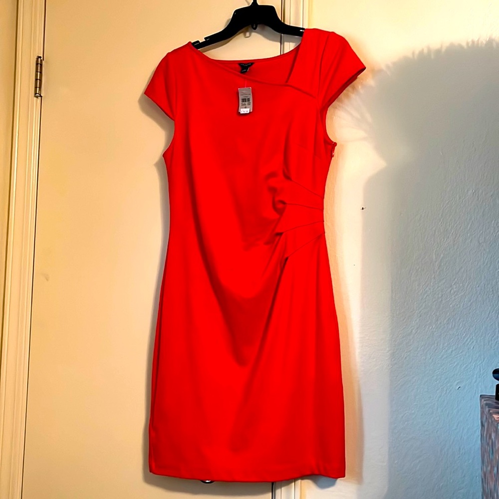 Ann Taylor Firecracker orange semi fitted dress with hidden side zipper.